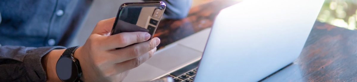 Male hand holding smartphone